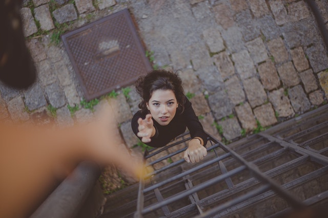 https://www.pexels.com/photo/high-angle-photo-of-woman-on-ladder-2467396/